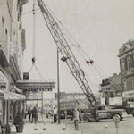 Hanging_an_awning_on_the_Safe_Store__1960s.jpg